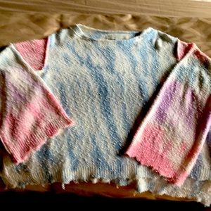 Vintage Havana slouchy sweater with side slits.